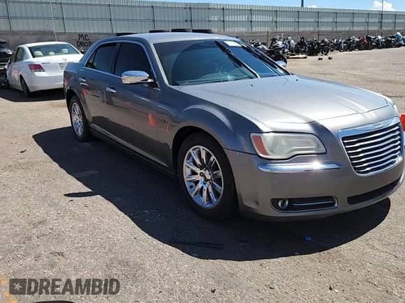 2012 Chrysler 300 Limited с VIN 2C3CCACG5CH250261, выставлен на аукционе Copart как лот 71208735 с пробегом 204 553 миль миль и Списание • Salvage title. История ставок и продаж доступна на DreamBid. Изображение 13.