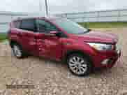 2017 Ford Escape Titanium с VIN 1FMCU9J9XHUD76627, выставлен на аукционе Copart как лот 64927275 с пробегом 116 043 миль миль и Списание • Salvage title. История ставок и продаж доступна на DreamBid. Изображение 4.