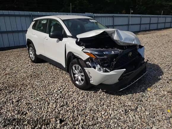 2023 Toyota Corolla Cross L z VIN 7MUAAABG4PV068817, wystawiony jako Copart lot #68871695 z przebiegiem 16 512 mil mil oraz Szkoda całkowita • Salvage title. Historia ofert i sprzedaży dostępna na DreamBid. Obrazek 14.