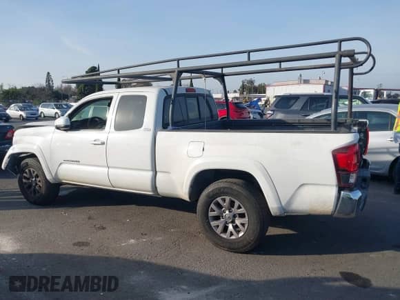 2018 Toyota Tacoma SR5 with VIN 5TFRZ5CN3JX064821, listed as a IAAI auction lot 41478807 with 106,495 mi miles and . Bid and sale history available at DreamBid. Image 15.