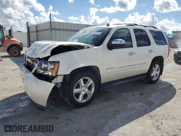 2012 Chevrolet Tahoe LTZ с VIN 1GNSCCE08CR214560, выставлен на аукционе Copart как лот 44723175 с пробегом 137 489 миль миль и Списание • Salvage title. История ставок и продаж доступна на DreamBid. Изображение 1.
