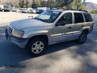 2000 Jeep Grand Cherokee Laredo с VIN 1J4G248SXYC314958, выставлен на аукционе Copart как лот 90101645 с пробегом 152 604 миль миль и Списание • Salvage title. История ставок и продаж доступна на DreamBid. Изображение 1.