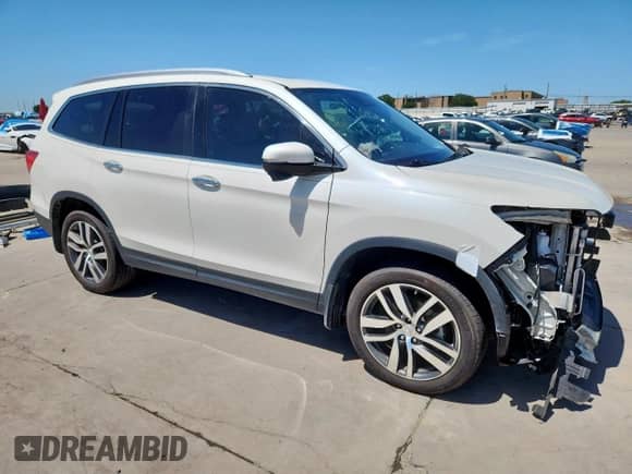 2017 Honda Pilot Touring с VIN 5FNYF5H91HB029652, выставлен на аукционе Copart как лот 66293335 с пробегом 63 291 миль миль и Чистый • Clean title. История ставок и продаж доступна на DreamBid. Изображение 4.