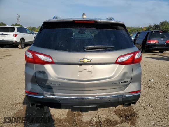 2018 Chevrolet Equinox Premier с VIN 3GNAXWEX0JS543164, выставлен на аукционе Copart как лот 80172865 с пробегом 52 811 миль миль и Списание • Salvage title. История ставок и продаж доступна на DreamBid. Изображение 6.