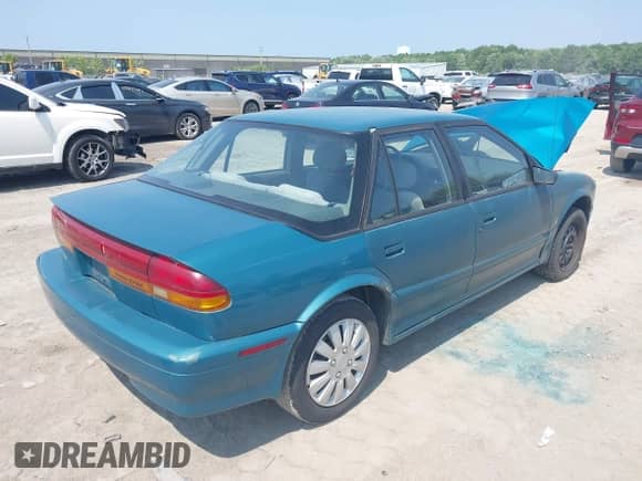 1994 Saturn SL с VIN 1G8ZJ557XRZ136761, выставлен на аукционе IAAI как лот 42476500 с пробегом 200 187 миль миль и . История ставок и продаж доступна на DreamBid. Изображение 4.