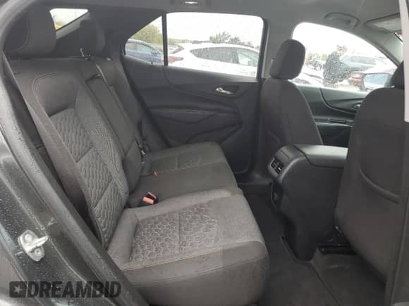 2018 Chevrolet Equinox LT z VIN 2GNAXJEV7J6270949, wystawiony jako Copart lot #85668995 z przebiegiem 102 763 mil mil oraz Szkoda całkowita • Salvage title. Historia ofert i sprzedaży dostępna na DreamBid. Obrazek 11.