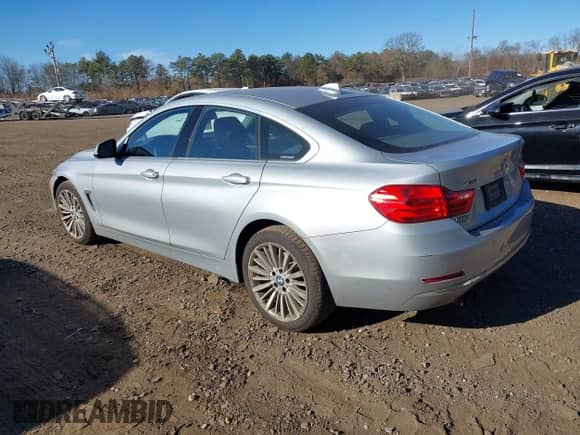 2015 BMW 4 Series 428i xDrive z VIN WBA4A7C59FD415086, wystawiony jako IAAI lot #40887646 z przebiegiem 61 870 mil mil oraz . Historia ofert i sprzedaży dostępna na DreamBid. Obrazek 3.