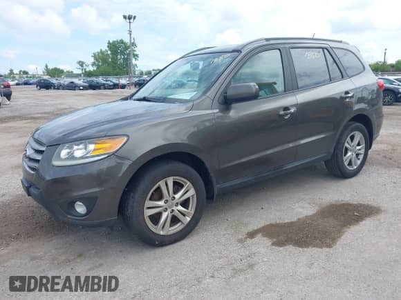 2012 Hyundai Santa Fe Limited with VIN 5XYZK4AG8CG118820, listed as a IAAI auction lot 42361850 with 298,744 mi miles and . Bid and sale history available at DreamBid. Image 2.