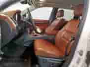 2016 Jeep Grand Cherokee Summit with VIN 1C4RJFJT1GC491042, listed as a Copart auction lot 69321305 with 138,005 mi miles and Clean title. Bid and sale history available at DreamBid. Image 7.