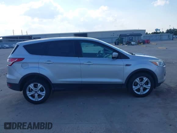 2014 Ford Escape SE z VIN 1FMCU0GX5EUA21457, wystawiony jako IAAI lot #43370908 z przebiegiem 143 709 mil mil oraz . Historia ofert i sprzedaży dostępna na DreamBid. Obrazek 13.