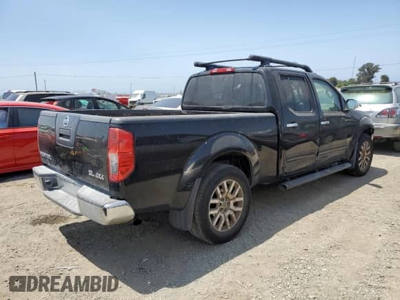 2012 Nissan Frontier SV with VIN 1N6AD0FV7CC473034, listed as a Copart auction lot 58096075 with 117,270 mi miles and Salvage title. Bid and sale history available at DreamBid. Image 3.