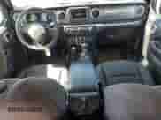 2023 Jeep Wrangler with VIN 1C4JJXN69PW628928, listed as a Copart auction lot 70861335 with 24,390 mi miles and Non repairable. Bid and sale history available at DreamBid. Image 8.