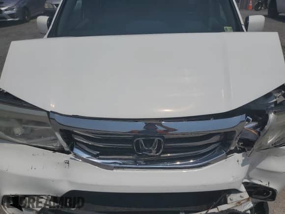 2014 Honda Pilot EX-L with VIN 5FNYF3H55EB017940, listed as a Copart auction lot 65397815 with 154,488 mi miles and Salvage title. Bid and sale history available at DreamBid. Image 12.