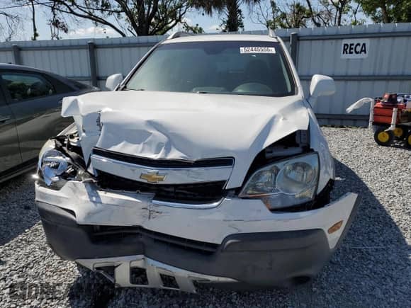2014 Chevrolet Captiva Sport LS z VIN 3GNAL1EK0ES590395, wystawiony jako Copart lot #52445555 z przebiegiem 143 320 mil mil oraz Szkoda całkowita • Salvage title. Historia ofert i sprzedaży dostępna na DreamBid. Obrazek 5.