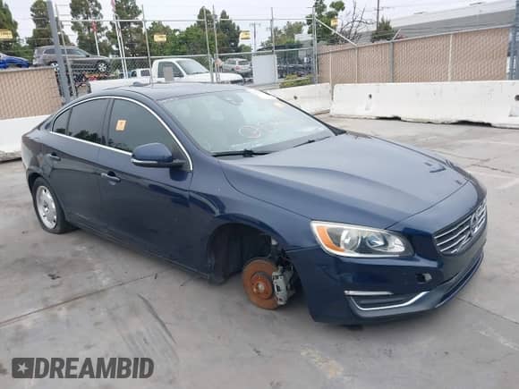 2015 Volvo S60 T5 Drive-E Premier with VIN YV126MFK0F2334740, listed as a IAAI auction lot 41480551 with Not provided miles and . Bid and sale history available at DreamBid. Image 1.