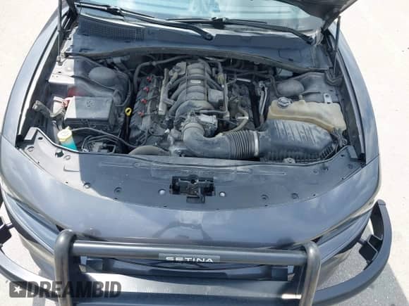 2020 Dodge Charger Police z VIN 2C3CDXKT6LH118253, wystawiony jako IAAI lot #42507562 z przebiegiem 128 786 mil mil oraz . Historia ofert i sprzedaży dostępna na DreamBid. Obrazek 10.