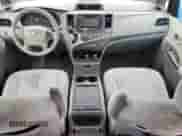 2014 Toyota Sienna LE with VIN 5TDJK3DC5ES093932, listed as a Copart auction lot 63611985 with 142,044 mi miles and Salvage title. Bid and sale history available at DreamBid. Image 8.