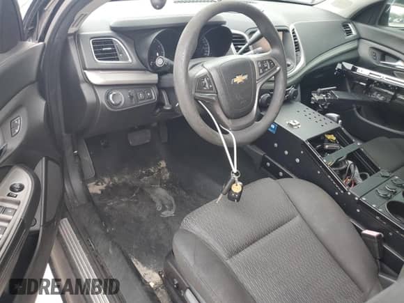 2014 Chevrolet Caprice Police Police с VIN 6G3NS5U25EL976468, выставлен на аукционе Copart как лот 71230174 с пробегом 100 112 миль миль и Списание • Salvage title. История ставок и продаж доступна на DreamBid. Изображение 8.