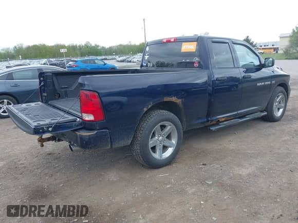 2012 Ram 1500 Express z VIN 1C6RD7FT0CS345213, wystawiony jako IAAI lot #42149548 z przebiegiem 155 464 mil mil oraz . Historia ofert i sprzedaży dostępna na DreamBid. Obrazek 4.