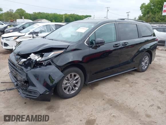 2023 Toyota Sienna LE with VIN 5TDKSKFC2PS084975, listed as a IAAI auction lot 42334415 with 30,886 mi miles and . Bid and sale history available at DreamBid. Image 2.