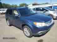 2011 Subaru Forester X Limited z VIN JF2SHAFC3BH773091, wystawiony jako Copart lot #69989415 z przebiegiem 148 987 mil mil oraz Szkoda całkowita • Salvage title. Historia ofert i sprzedaży dostępna na DreamBid. Obrazek 4.