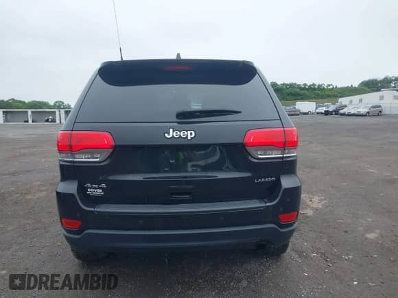 2019 Jeep Grand Cherokee Laredo E with VIN 1C4RJFAG7KC561512, listed as a IAAI auction lot 42473388 with 76,468 mi miles and . Bid and sale history available at DreamBid. Image 16.