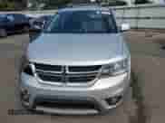 2014 Dodge Journey SXT with VIN 3C4PDDBG4ET190769, listed as a Copart auction lot 80368705 with 140,649 mi miles and Salvage title. Bid and sale history available at DreamBid. Image 5.