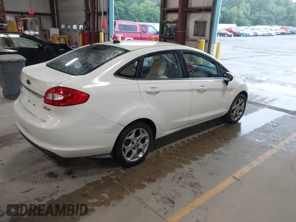 2012 Ford Fiesta SEL with VIN 3FADP4CJXCM161505, listed as a IAAI auction lot 42716954 with 153,982 mi miles and . Bid and sale history available at DreamBid. Image 4.
