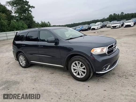2014 Dodge Durango SXT with VIN 1C4RDHAG4EC974527, listed as a Copart auction lot 71512885 with 173,145 mi miles and Salvage title. Bid and sale history available at DreamBid. Image 15.