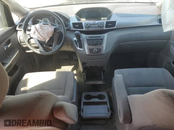 2015 Honda Odyssey LX with VIN 5FNRL5H21FB087306, listed as a Copart auction lot 70698795 with 148,351 mi miles and Salvage title. Bid and sale history available at DreamBid. Image 8.