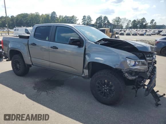 2022 Chevrolet Colorado 4WD Z71 with VIN 1GCGTDENXN1206820, listed as a Copart auction lot 71644885 with 48,237 mi miles and Salvage title. Bid and sale history available at DreamBid. Image 4.