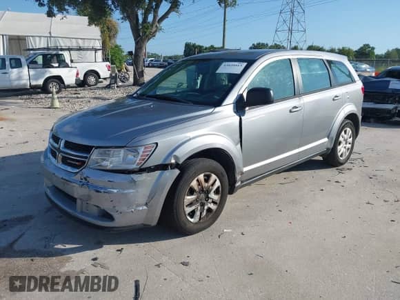 2015 Dodge Journey American Value with VIN 3C4PDCAB2FT521480, listed as a IAAI auction lot 43039515 with 152,197 mi miles and . Bid and sale history available at DreamBid. Image 2.