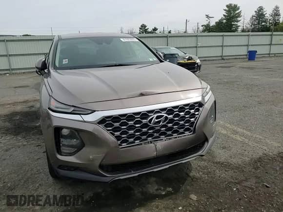 2019 Hyundai Santa Fe SE с VIN 5NMS23AD6KH029639, выставлен на аукционе Copart как лот 81923055 с пробегом 110 286 миль миль и Списание • Salvage title. История ставок и продаж доступна на DreamBid. Изображение 14.