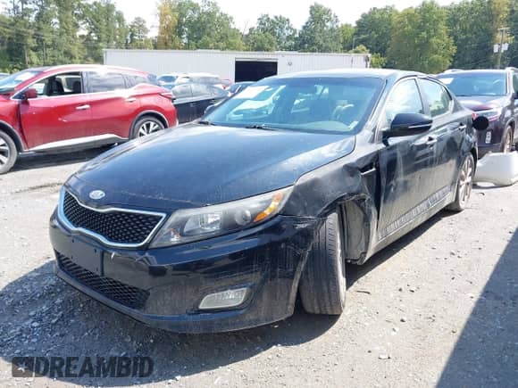 2014 Kia Optima LX with VIN 5XXGM4A76EG302498, listed as a IAAI auction lot 43129196 with 188,849 mi miles and . Bid and sale history available at DreamBid. Image 2.