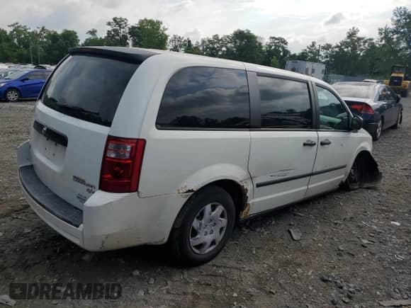 2010 Dodge Grand Caravan Cargo with VIN 2D4RN1AE3AR119468, listed as a Copart auction lot 66057014 with 86,801 mi miles and Salvage title. Bid and sale history available at DreamBid. Image 3.
