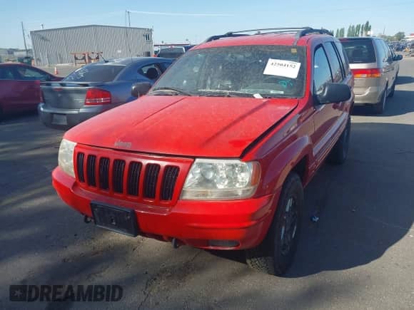 2000 Jeep Grand Cherokee Limited z VIN 1J4GW58N5YC186410, wystawiony jako IAAI lot #42504152 z przebiegiem 140 982 mil mil oraz . Historia ofert i sprzedaży dostępna na DreamBid. Obrazek 6.