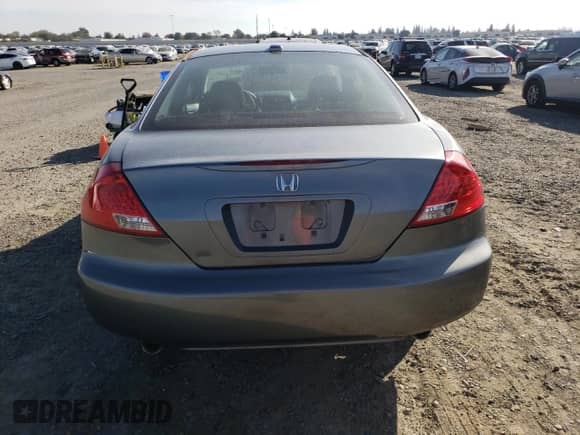 2007 Honda Accord EX-L with VIN 1HGCM82647A000381, listed as a Copart auction lot 82743035 with 128,027 mi miles and Salvage title. Bid and sale history available at DreamBid. Image 6.