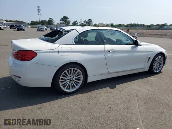 2015 BMW 4 Series 428i z VIN WBA3V7C57FP772880, wystawiony jako Copart lot #62740295 z przebiegiem 107 673 mil mil oraz Szkoda całkowita • Salvage title. Historia ofert i sprzedaży dostępna na DreamBid. Obrazek 3.