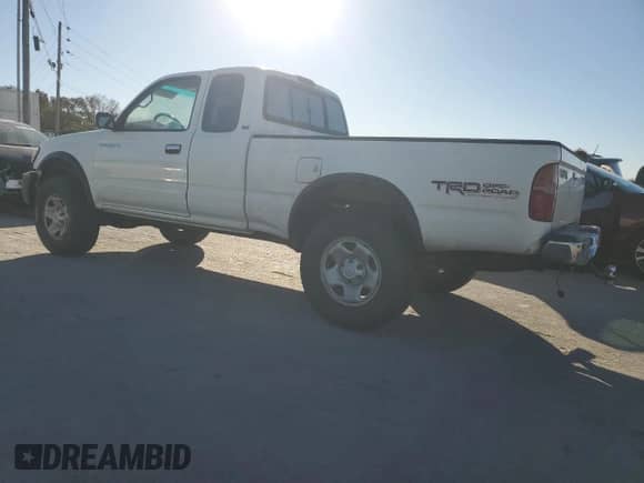 1998 Toyota Tacoma with VIN 4TASM92N1WZ175674, listed as a Copart auction lot 89734125 with 214,966 mi miles and Salvage title. Bid and sale history available at DreamBid. Image 2.