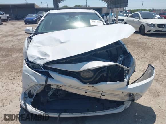 2018 Toyota Camry SE z VIN 4T1B11HK0JU023012, wystawiony jako IAAI lot #43142534 z przebiegiem 122 170 mil mil oraz . Historia ofert i sprzedaży dostępna na DreamBid. Obrazek 13.