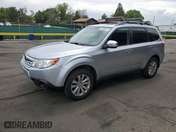 2012 Subaru Forester X Premium z VIN JF2SHBDC9CG422928, wystawiony jako Copart lot #58148675 z przebiegiem 57 652 mil mil oraz Szkoda całkowita • Salvage title. Historia ofert i sprzedaży dostępna na DreamBid. Obrazek 1.