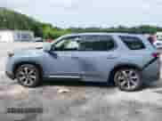 2025 Honda Pilot Touring with VIN 5FNYG2H70SB011614, listed as a IAAI auction lot 42205848 with 37,719 mi miles and . Bid and sale history available at DreamBid. Image 14.