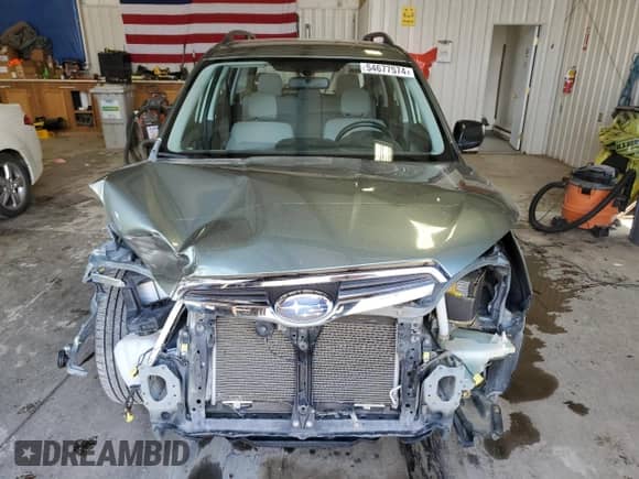 2015 Subaru Forester z VIN SA0123301, wystawiony jako Copart lot #54677574 z przebiegiem 58 430 mil mil oraz Szkoda całkowita • Salvage title. Historia ofert i sprzedaży dostępna na DreamBid. Obrazek 5.