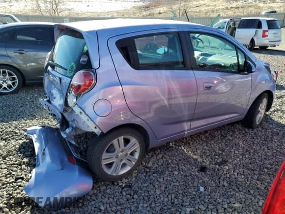 2015 Chevrolet Spark LS with VIN KL8CA6S94FC741826, listed as a Copart auction lot 45043085 with 6,275 mi miles and Salvage title. Bid and sale history available at DreamBid. Image 3.