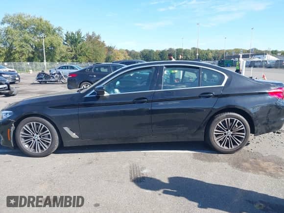 2019 BMW 5 Series 530i xDrive with VIN WBAJA7C59KWW15919, listed as a IAAI auction lot 43396100 with 104,228 mi miles and . Bid and sale history available at DreamBid. Image 14.