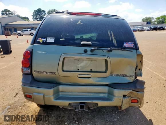 2004 Chevrolet TrailBlazer LT with VIN 1GNDS13S242308271, listed as a Copart auction lot 57851085 with Not provided miles and Salvage title. Bid and sale history available at DreamBid. Image 6.