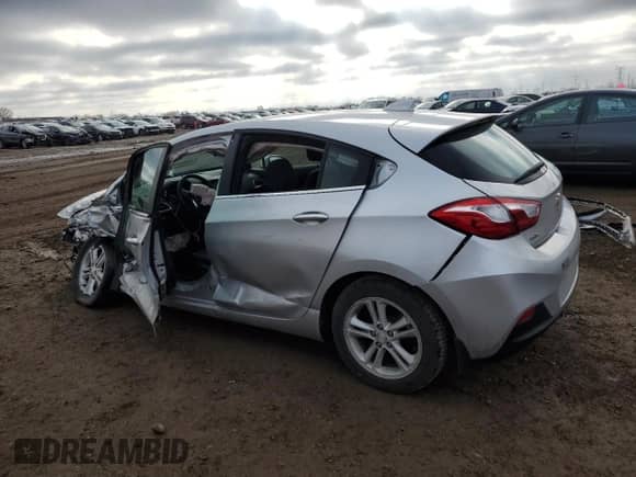 2018 Chevrolet Cruze LT с VIN 3G1BH6SE8JS650680, выставлен на аукционе Copart как лот 85450164 с пробегом 82 765 миль миль и Списание • Salvage title. История ставок и продаж доступна на DreamBid. Изображение 2.