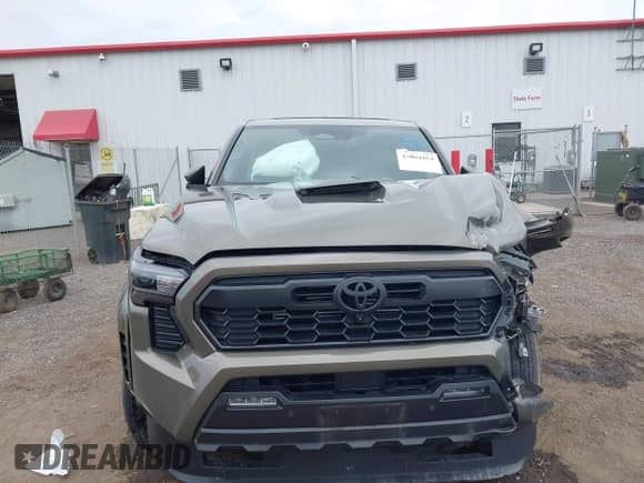 2024 Toyota Tacoma TRD Off Road with VIN 3TMLB5JN0RM045707, listed as a IAAI auction lot 43084854 with Not provided miles and . Bid and sale history available at DreamBid. Image 11.