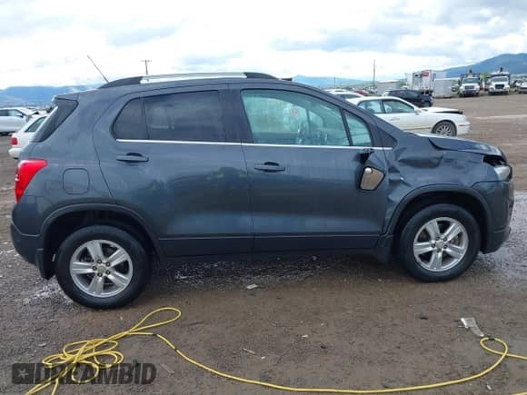 2016 Chevrolet Trax LT z VIN 3GNCJPSB0GL124016, wystawiony jako IAAI lot #42267266 z przebiegiem 102 265 mil mil oraz . Historia ofert i sprzedaży dostępna na DreamBid. Obrazek 13.