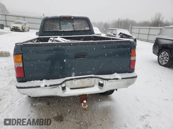 1997 Toyota Tacoma z VIN 4TAWM72N2VZ315302, wystawiony jako Copart lot #87952085 z przebiegiem 190 437 mil mil oraz Szkoda całkowita • Salvage title. Historia ofert i sprzedaży dostępna na DreamBid. Obrazek 6.